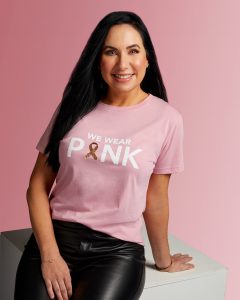 Picture of a woman with long dark hair wearing a tee shirt and jeans