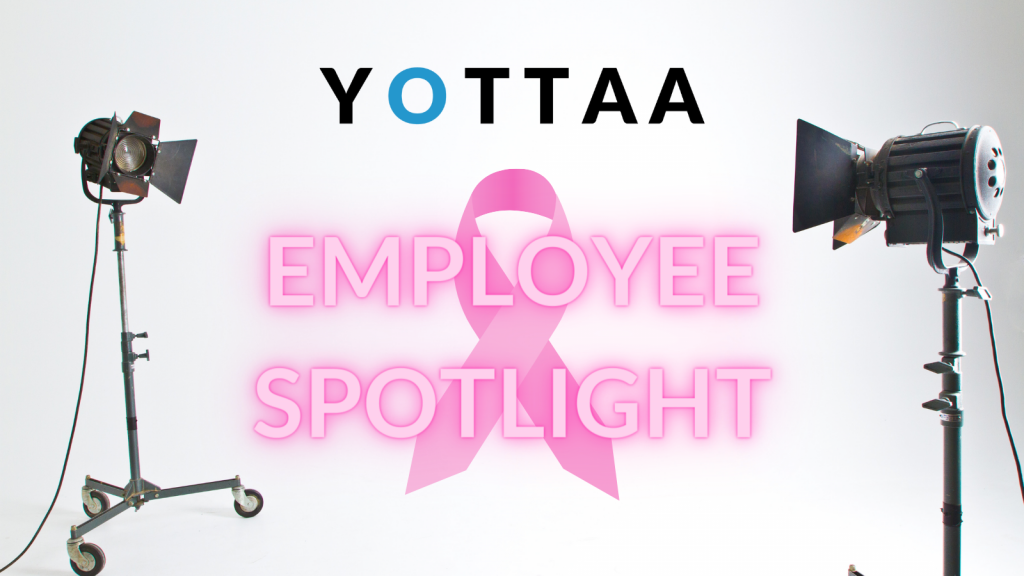 Picture of spotlights and a pink breast cancer awareness ribbon