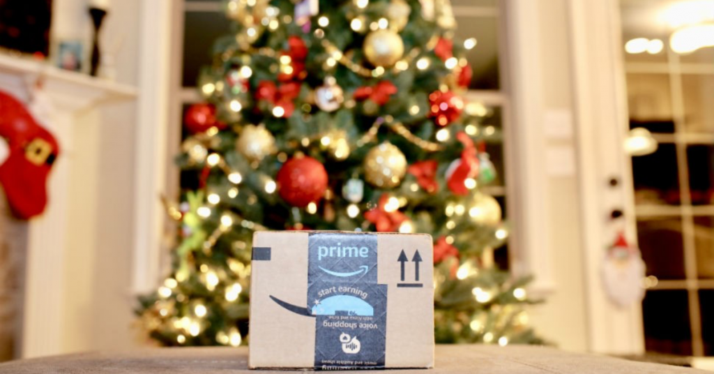 picture of Christmas tree with a prime package for blog about what prime day means to ecommerce