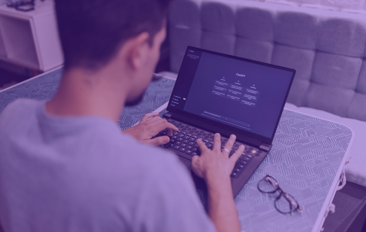 Person opening a ChatGPT chat on a laptop