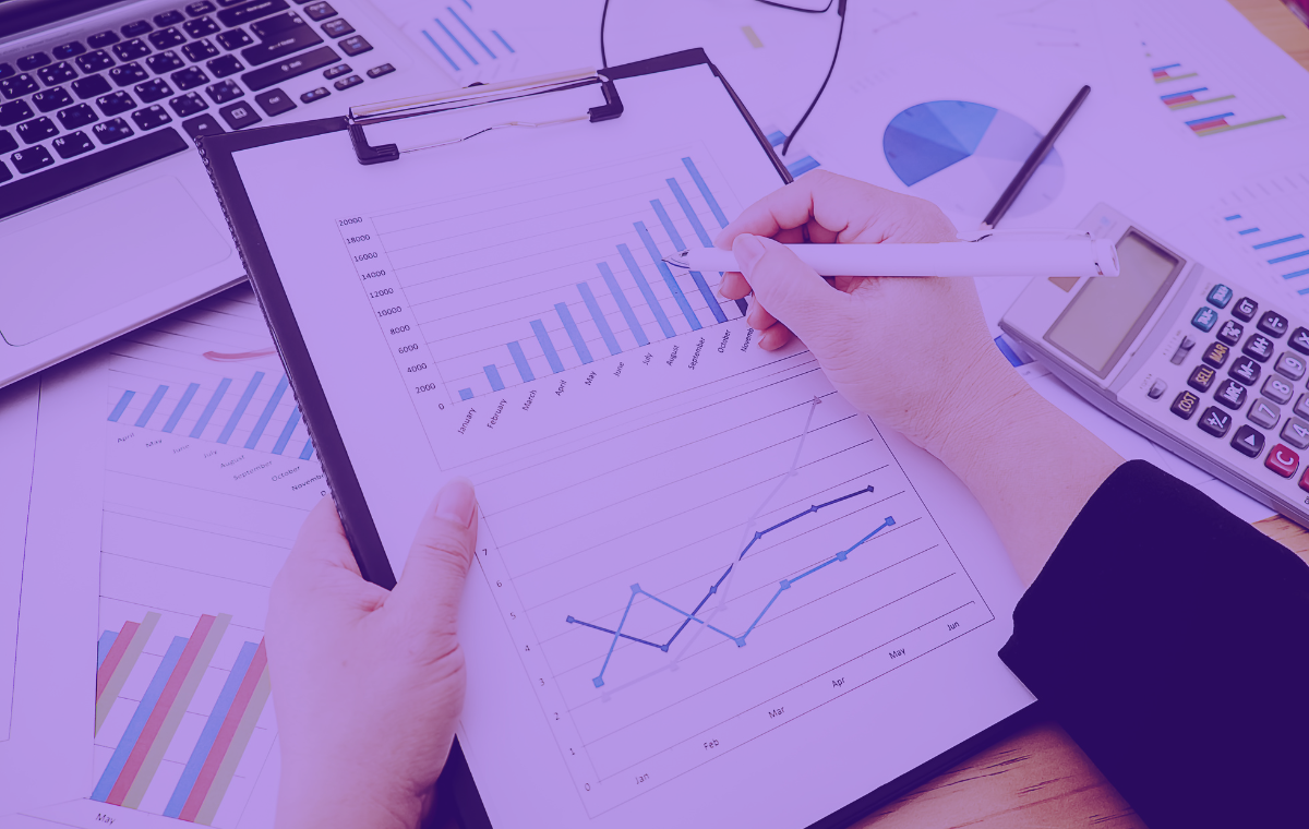 A person studying analytics and ROI documents