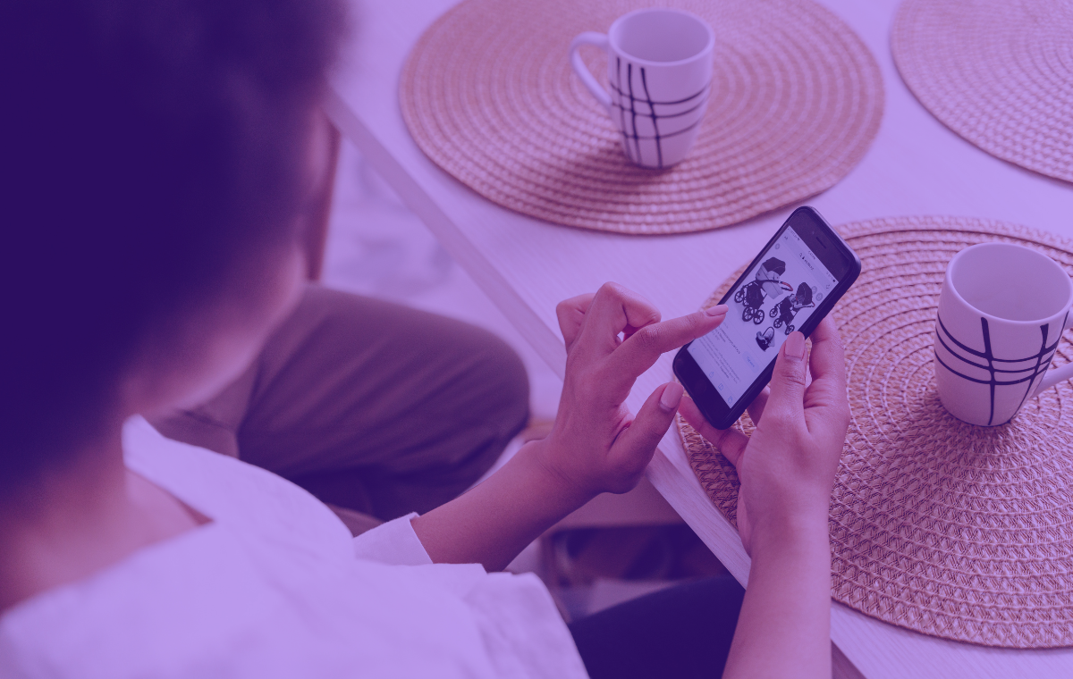 A woman shopping using her phone